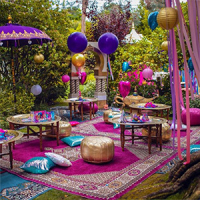 morrocan style picnic set up with floating balloons